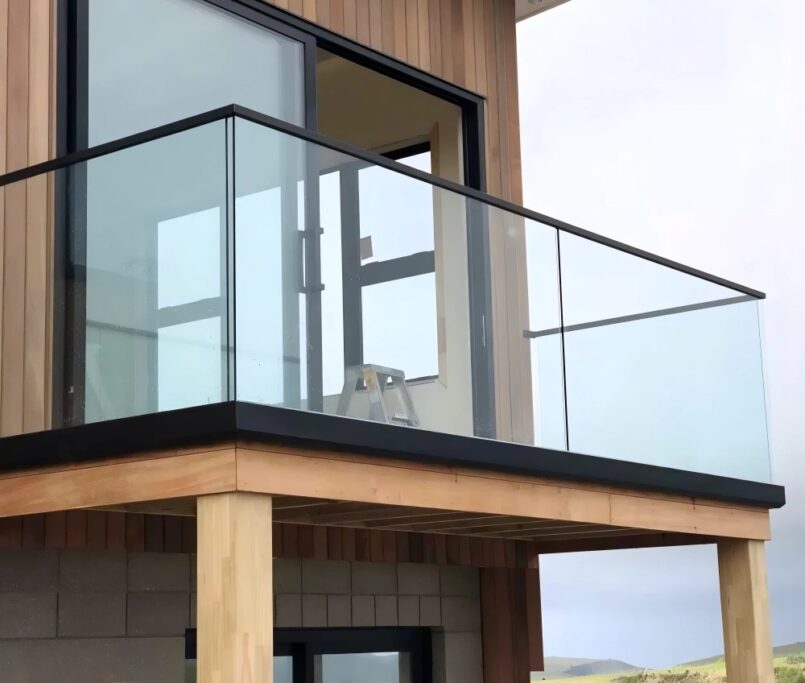 Outdoor top rail frameless glass railings