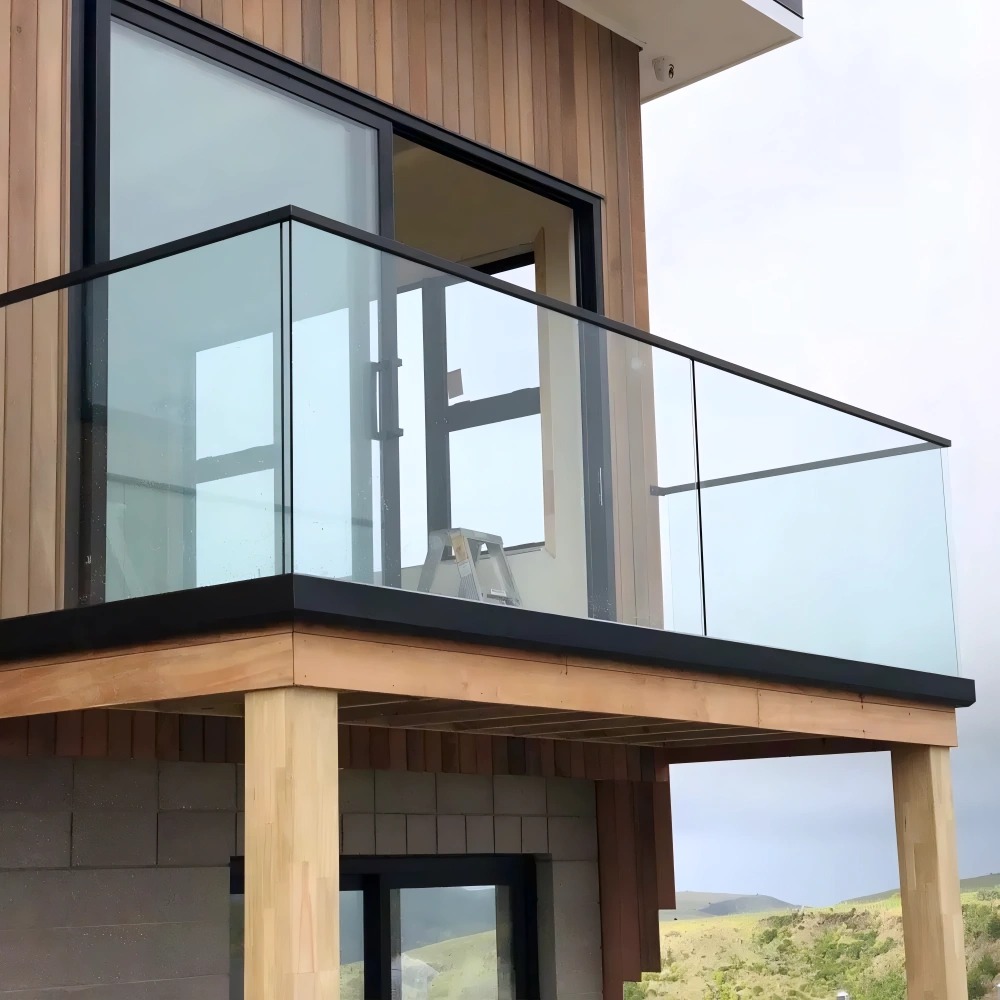 Outdoor top rail frameless glass railings