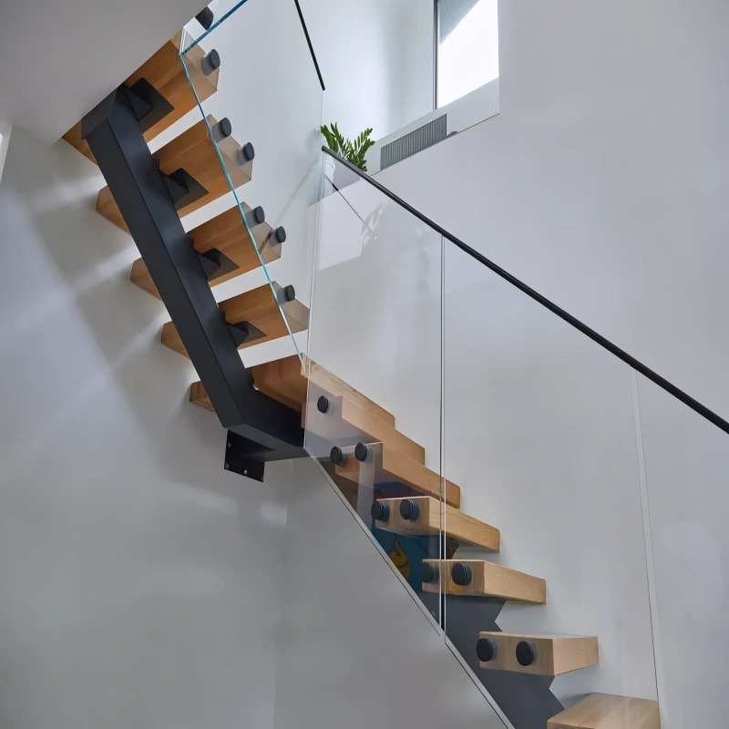 Standoff Glass Railings with Metal Top Rail in Modern Home