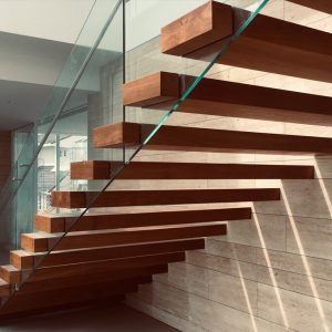 Frameless glass railing installation on a modern Toronto home